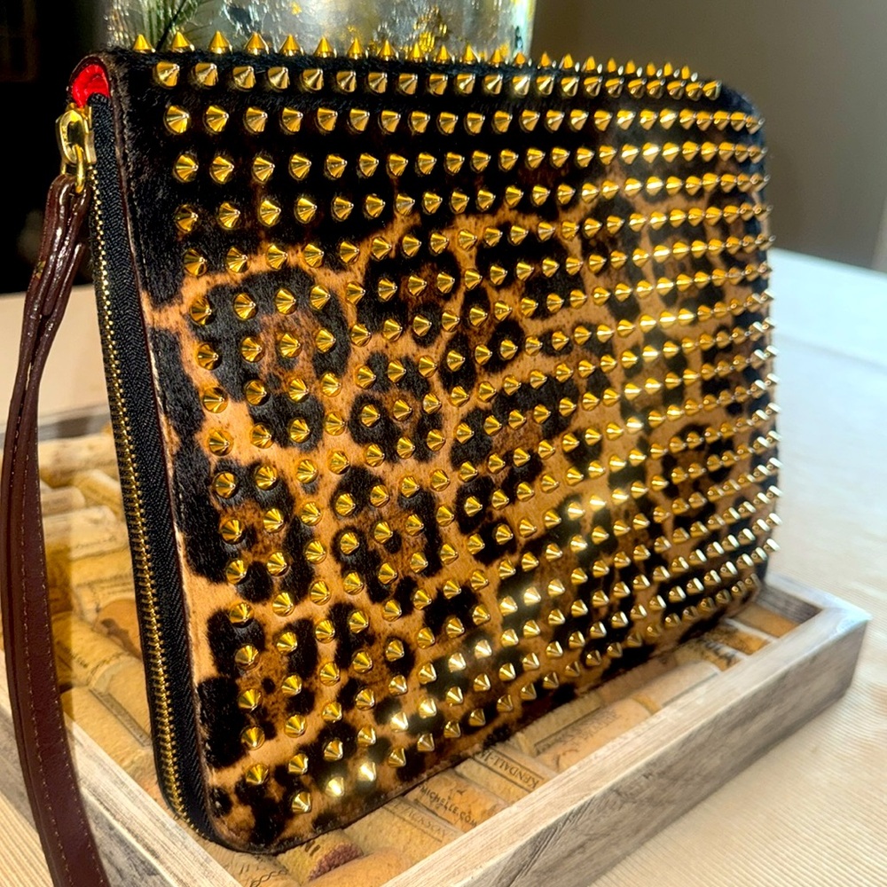 Christian Louboutin studded leopard pony hair iPad/tablet case or clutch bag